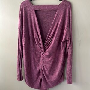 Like new tunic sweater crew neck but back has twist detail with split bottom